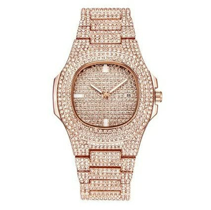 Elegante gouden horloge met subtiele parel