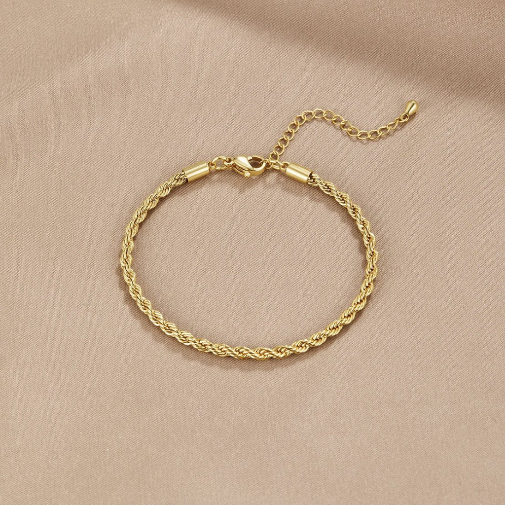 Sophisticated gold bracelet with an elegant twist